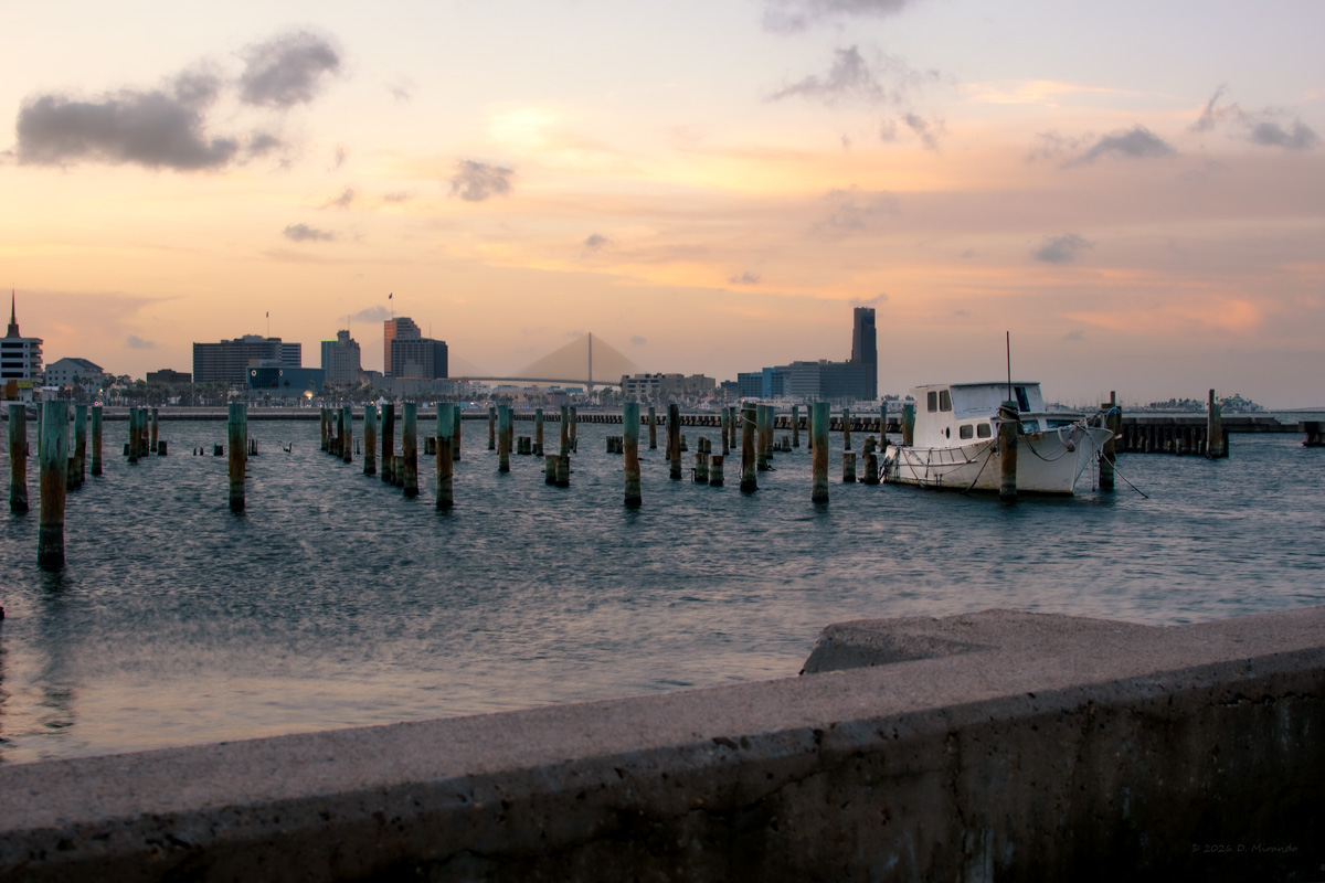 slide 2: Warm sunset light on a marina