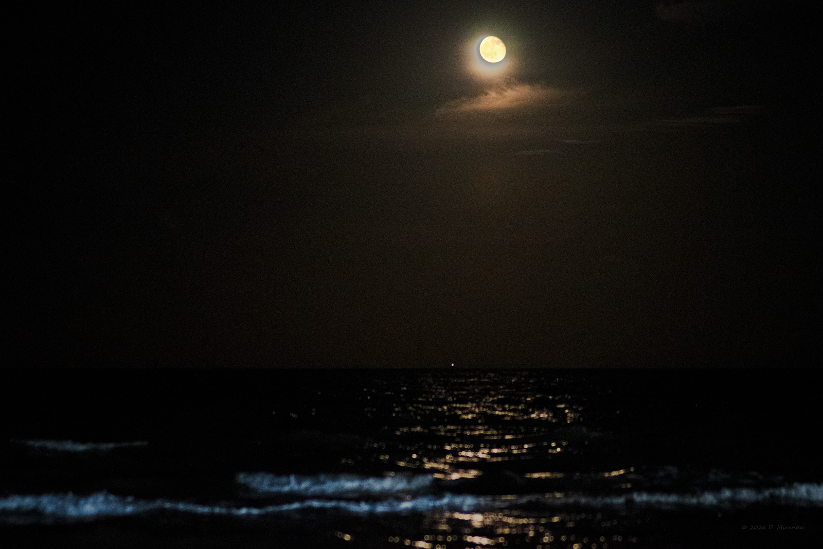 Slide 3: Moon rise over the bay